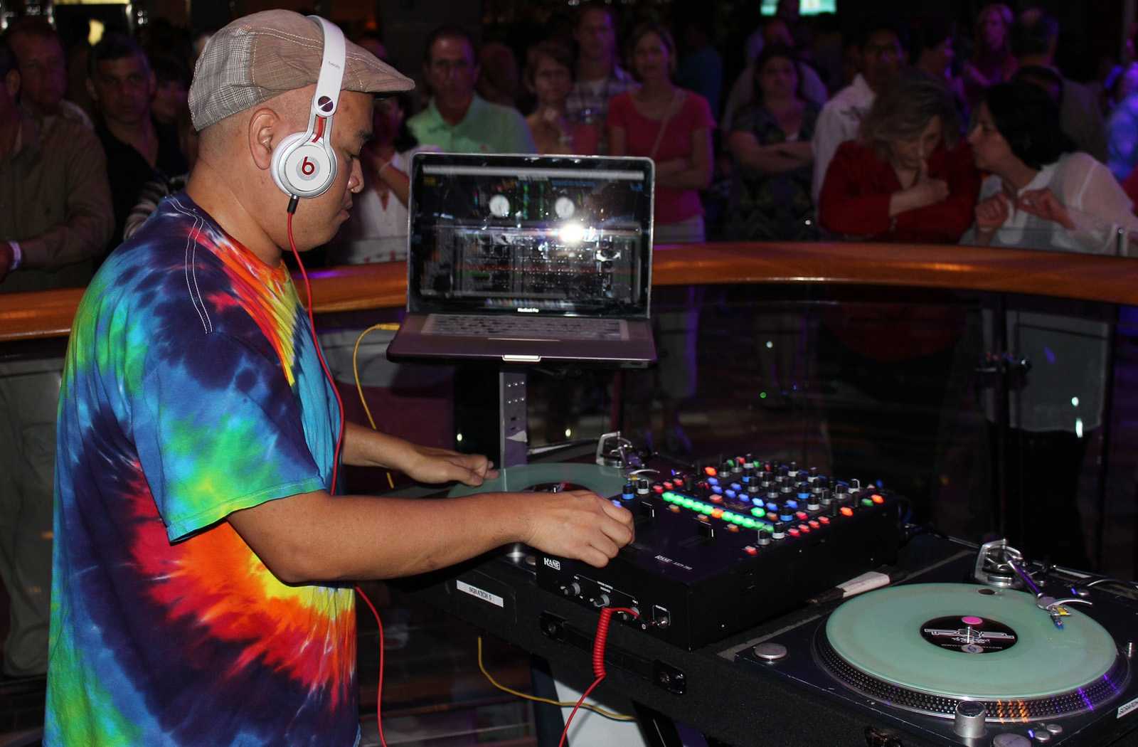 Why DJs Wear Headphones When Mixin?